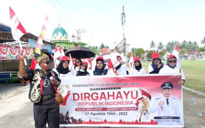 Pemerintah Desa Manunggal Jaya Tetap Semangat, Meski Diguyur Hujan di Tengah Karnaval Pembangunan